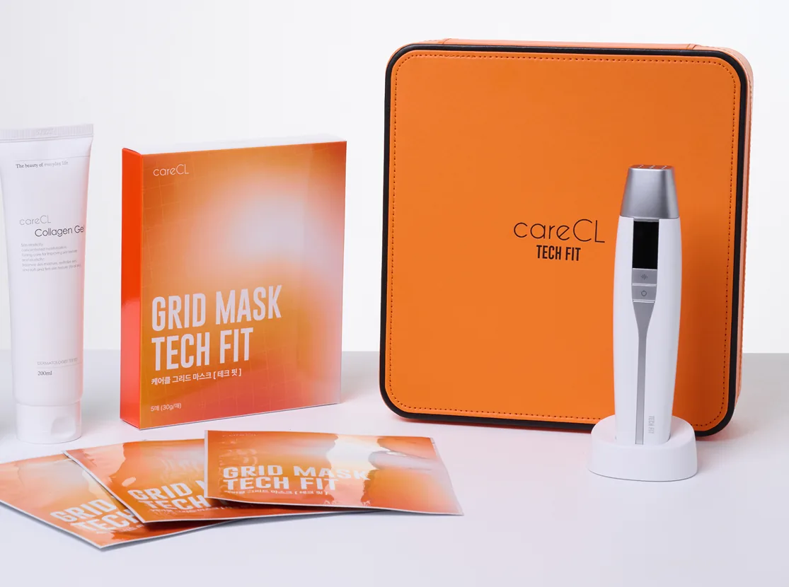 Bodegón: gel, caja Grid Mask, sobres, estuche naranja y TECH FIT en base